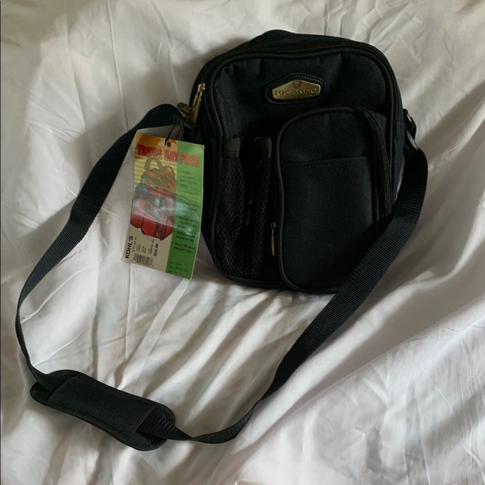 Dark Blue Travel Bag with Adjustable Strap and Durable Material